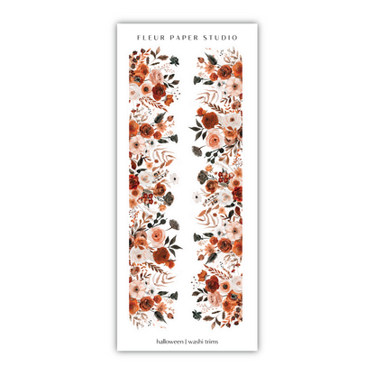 a bookmark with flowers and leaves on it