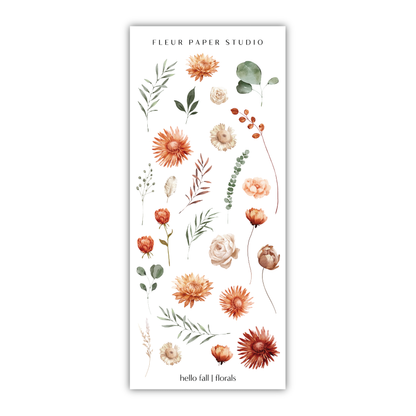 a bookmark with flowers and leaves on it