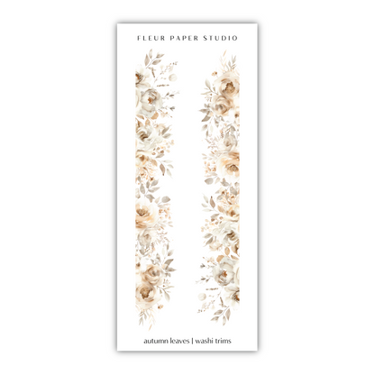 a bookmark with flowers and leaves on it