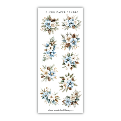 a white sticker with blue flowers and pine cones