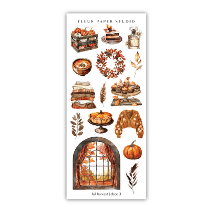 a sticker sheet with a window and fall decorations