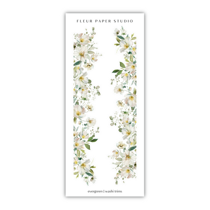 a white bookmark with flowers and leaves on it