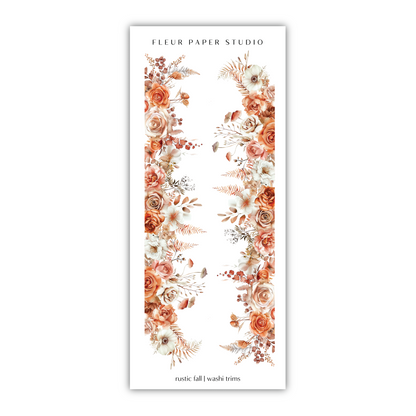 a white bookmark with flowers and leaves on it