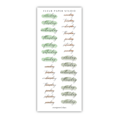 a bookmark with green watercolor writing on it